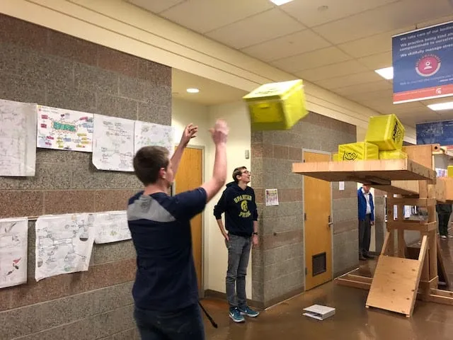 Students test strategies for the new game