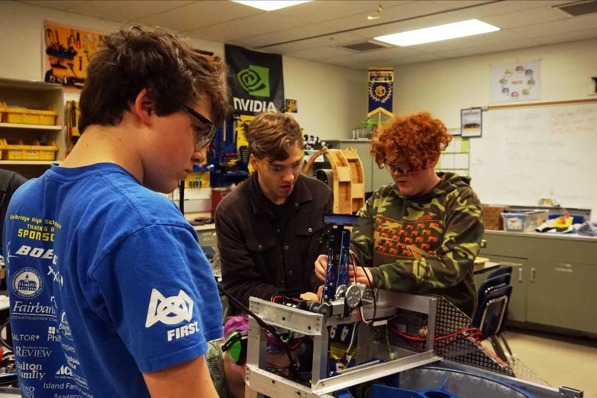 Spartronics pouring their sweat, blood, and tears into their work