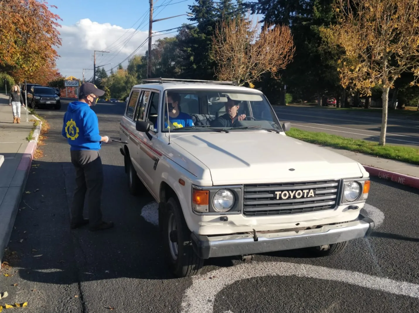 Coach Chee with car