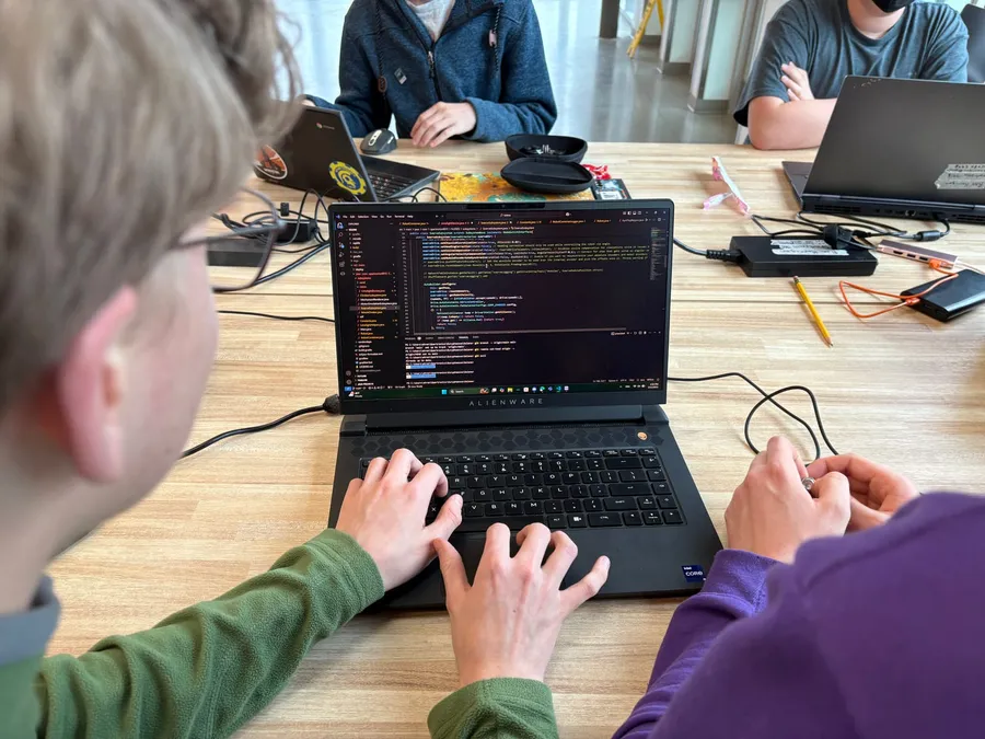 Spartronics programmers working on robot code